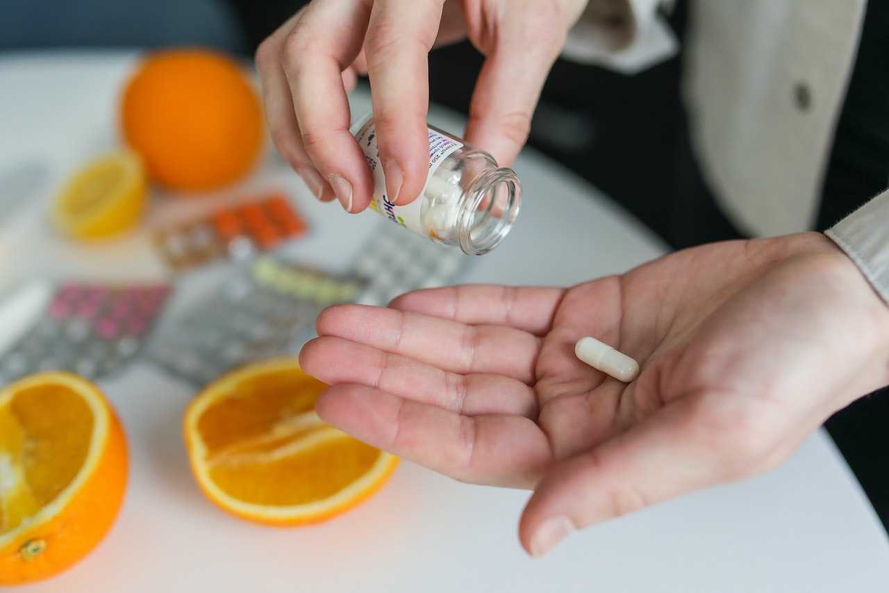 Woman is going to take her hair supplements